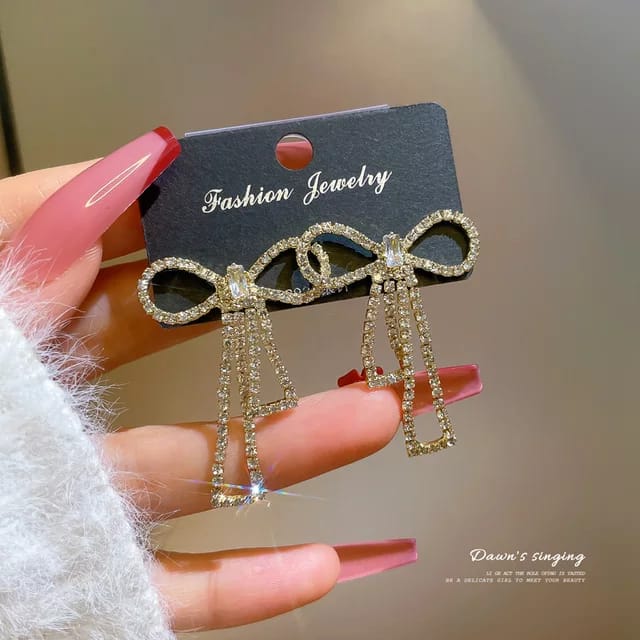 Yu Fashions Bow Shaped Rhinestone High Fashion Korean earrings Pair