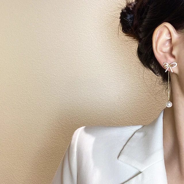 Yu Fashions Bow Shaped Crystal Drop Pearl High Fashion Korean Earrings Pair
