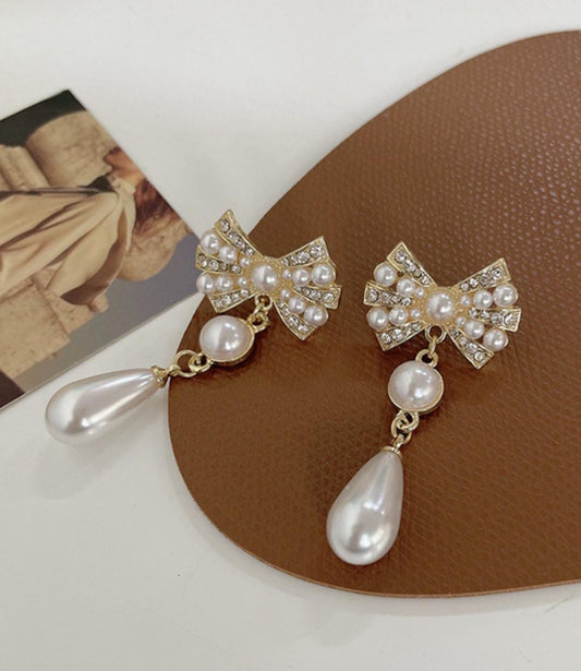 Yu Fashions Crystal Pearl Bow Shaped High Fashion Pearl Drop Korean Earrings Pair