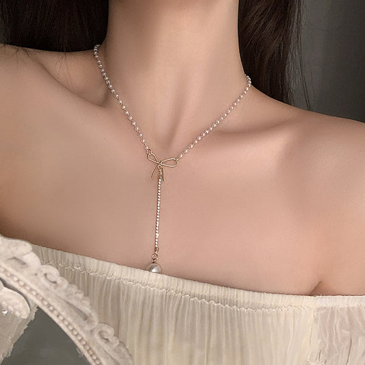 Yu Fashions Pearl rhinestone Bow High Fashion Drop Pendent Necklace Chain
