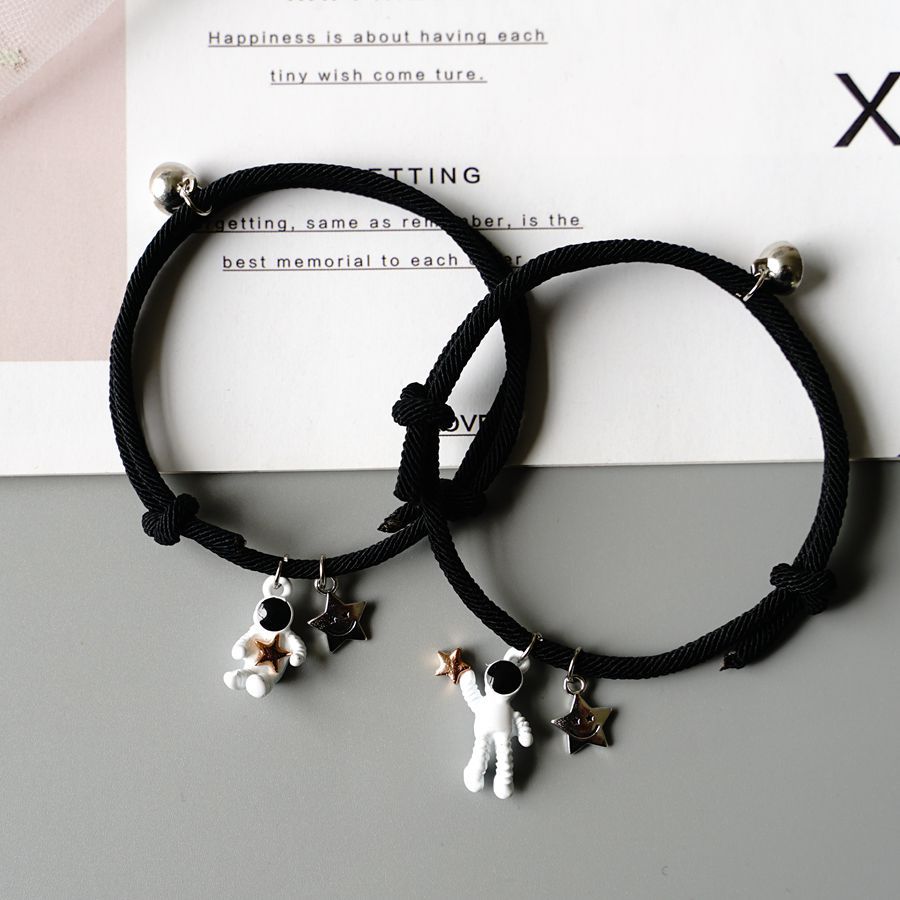 Yu Fashions Couple Sister Best Friend Magnetic Astronaut Black Rope Magnetic Korean Bracelet set of 2