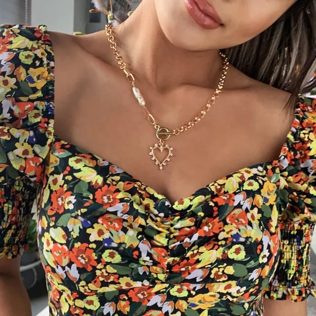 Yu Fashions Metal Heart Pearl High Fashion Pendent Necklace Chain