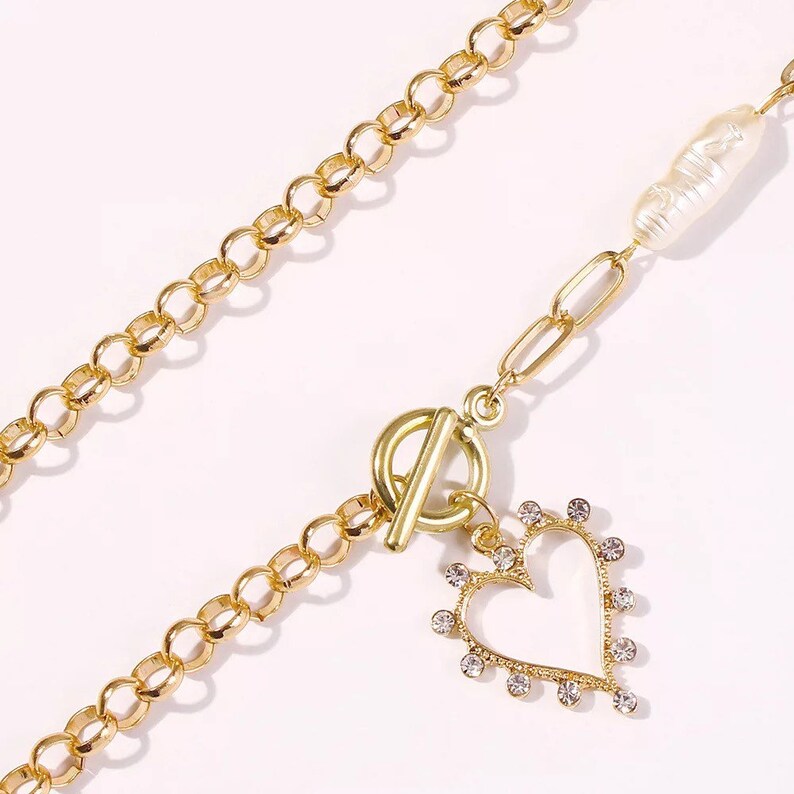 Yu Fashions Metal Heart Pearl High Fashion Pendent Necklace Chain