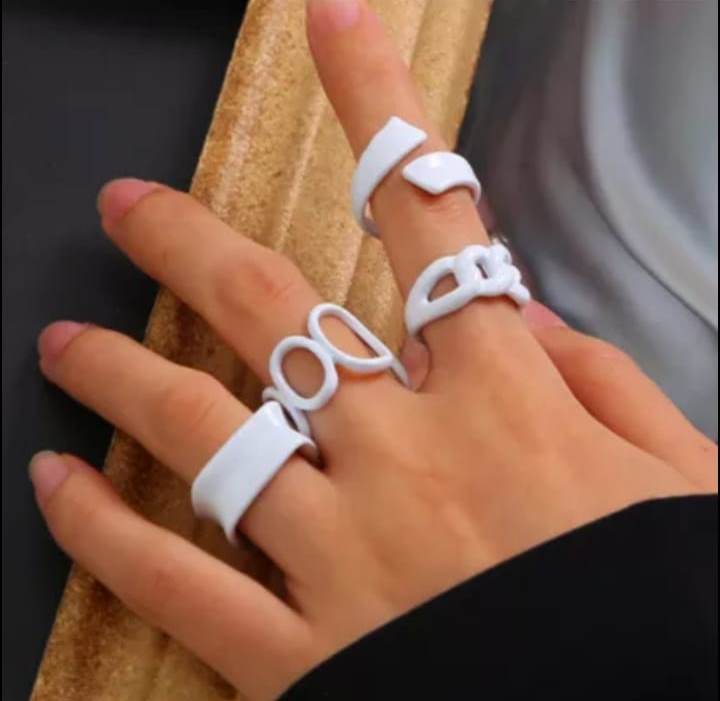 Yu Fashions trendy Punk Funky Acrylic Geometric Hollow White Ring Set of 4