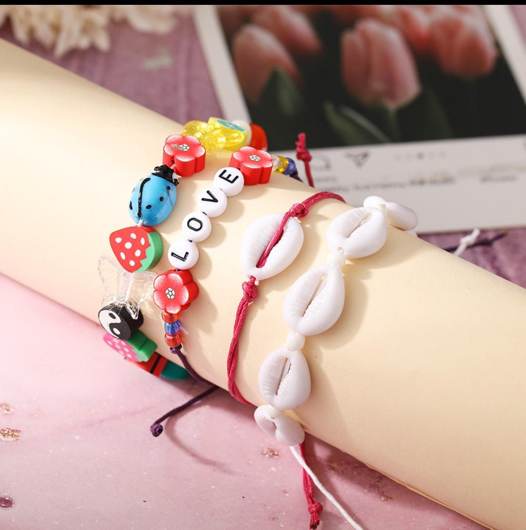 Yu Fashions 4 Layered White Shell LOVE letter flower Bug Multilayered Korean Bracelet