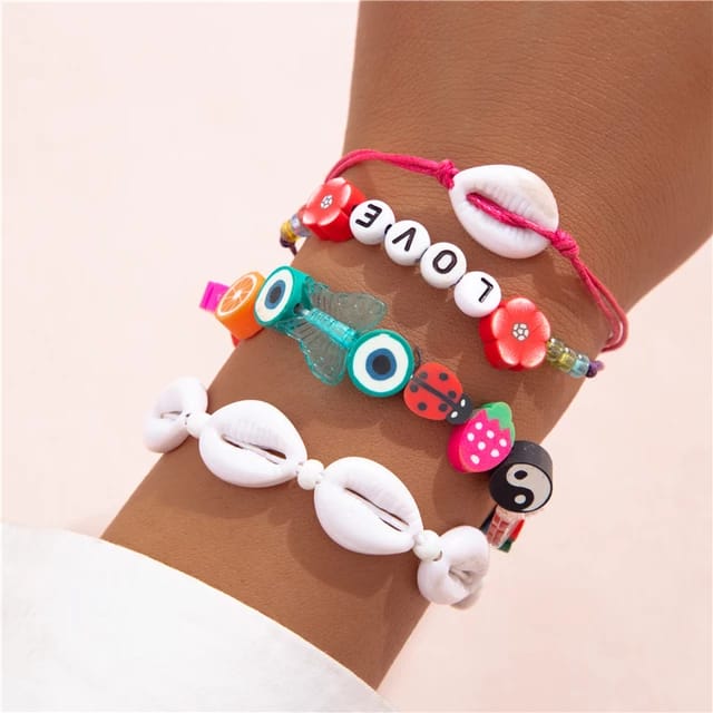 Yu Fashions 4 Layered White Shell LOVE letter flower Bug Multilayered Korean Bracelet