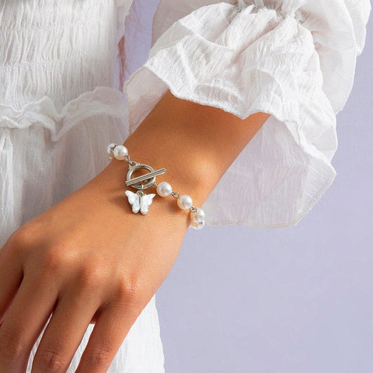 Yu Fashions White Pearl Cute Butterfly Korean Bracelet