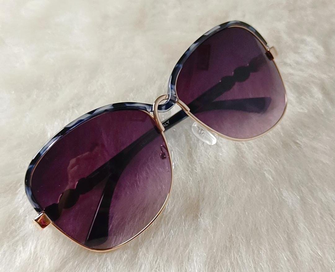 Yu Fashions Twisted frame UV Protracted High Fashion Korean Sunglasses