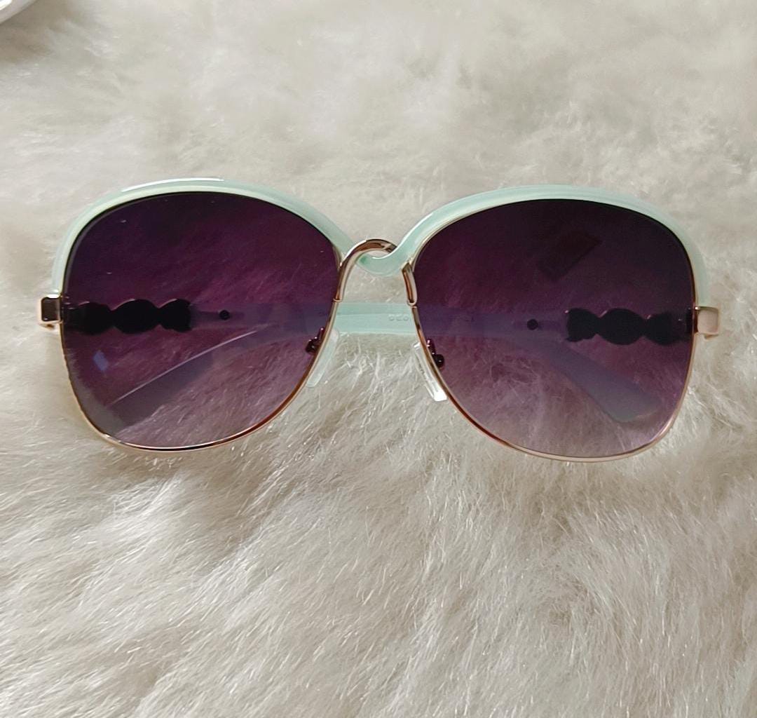 Yu Fashions Twisted frame UV Protracted High Fashion Korean Sunglasses