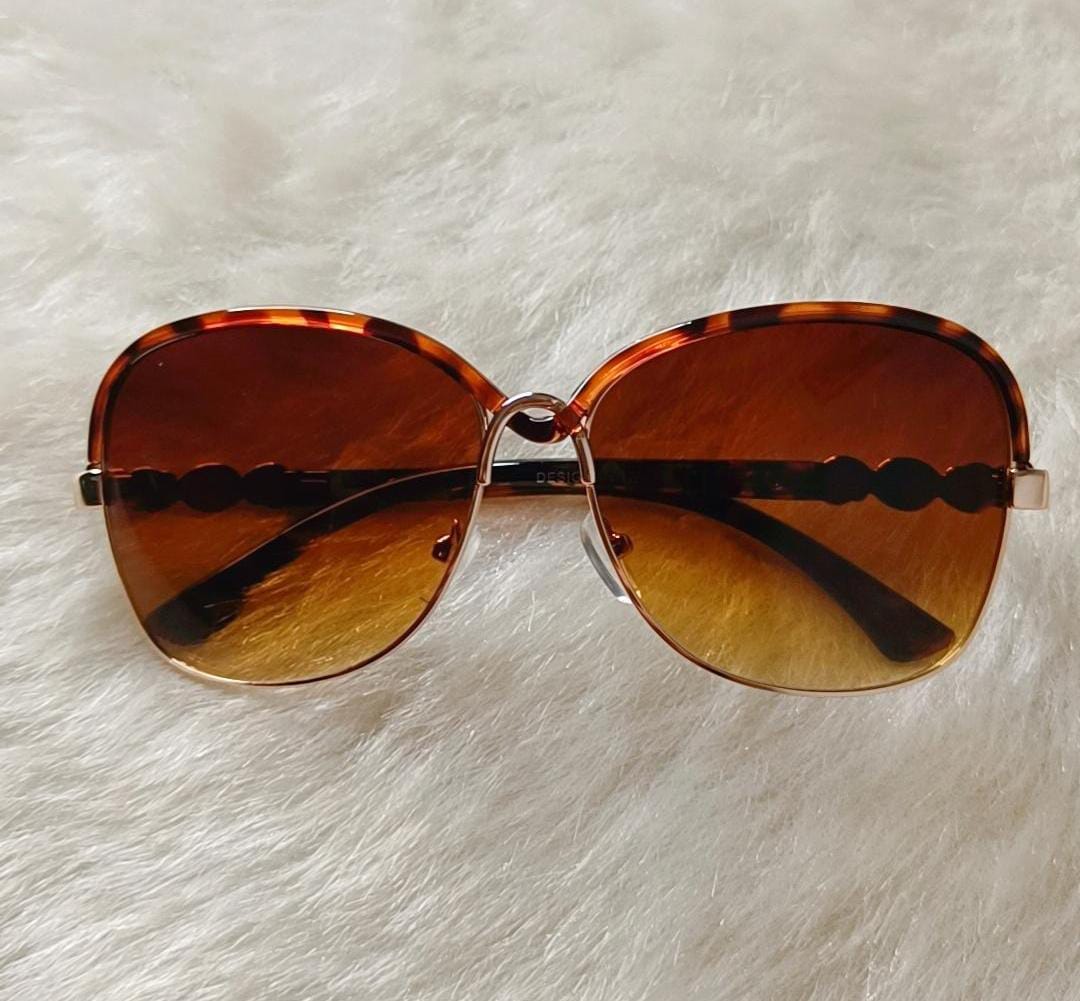 Yu Fashions Twisted frame UV Protracted High Fashion Korean Sunglasses