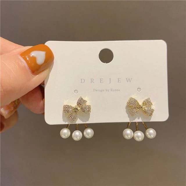 Yu Fashions Rhinestone Bow Pearl Korean Earrings Pair