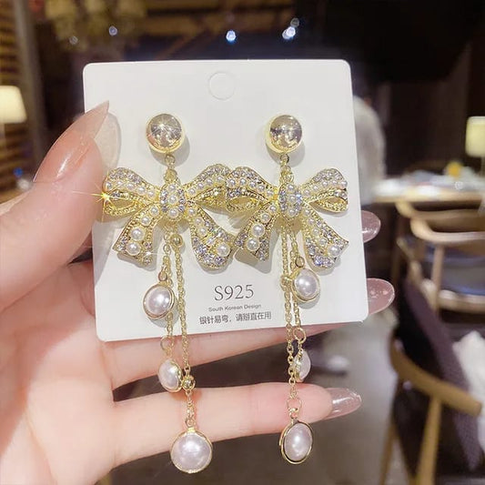 Yu Fashions Bow Knot High Fashion Pearl Crystal Korean earrings Pair