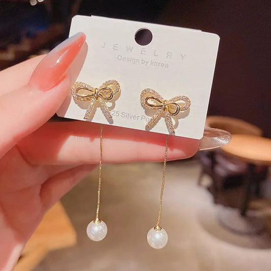 Yu Fashions Bow Shaped Crystal Drop Pearl High Fashion Korean Earrings Pair