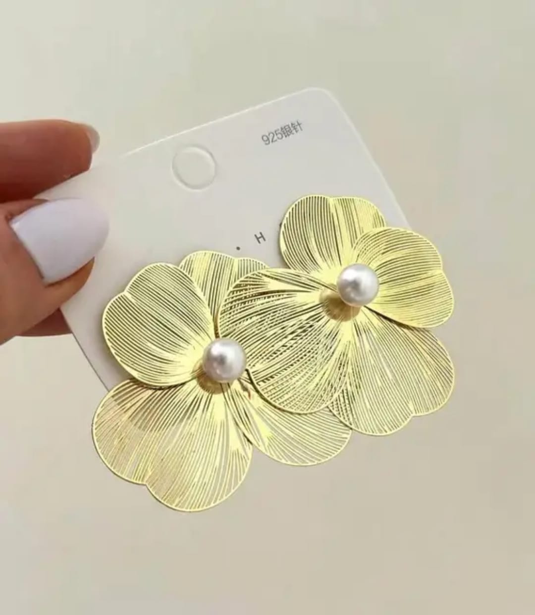 Yu Fashions Geometrical Flower Shaped  three petaled pansi inspired Lumi Pearl High Fashion Korean earrings