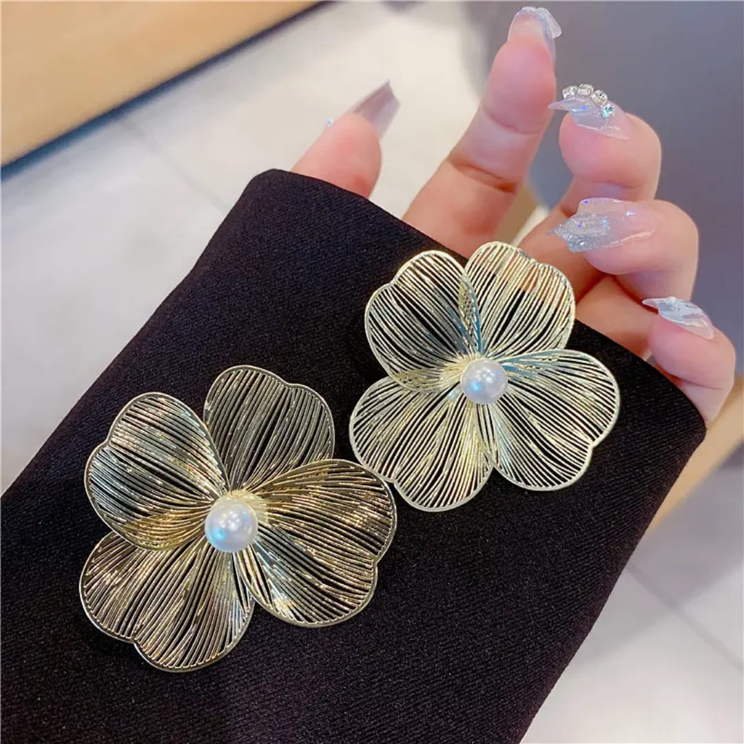 Yu Fashions Geometrical Flower Shaped  three petaled pansi inspired Lumi Pearl High Fashion Korean earrings