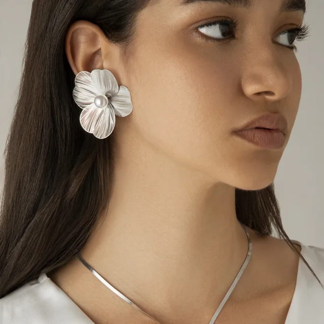 Yu Fashions Geometrical Flower Shaped  three petaled pansi inspired Lumi Pearl High Fashion Korean earrings