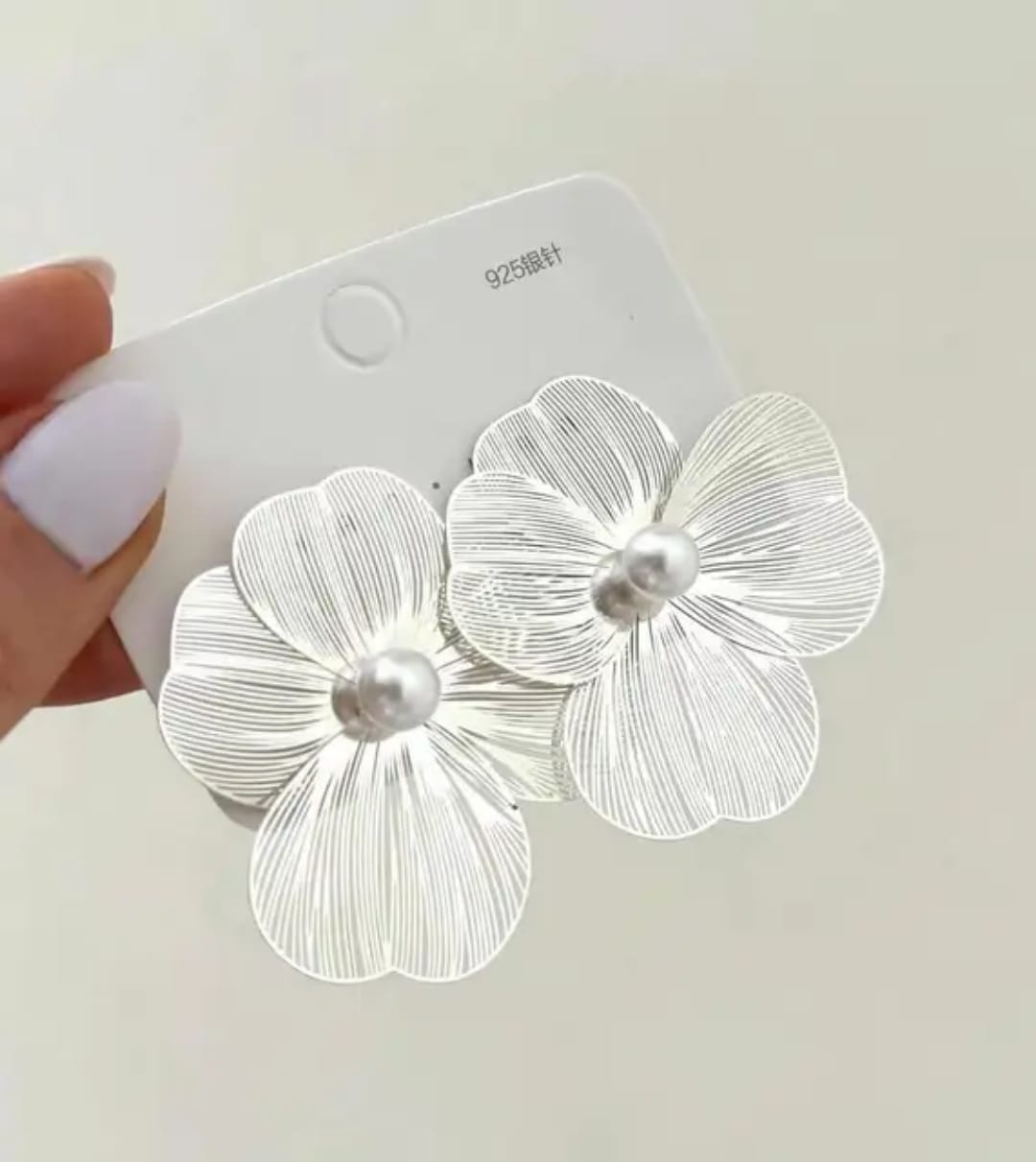 Yu Fashions Geometrical Flower Shaped  three petaled pansi inspired Lumi Pearl High Fashion Korean earrings